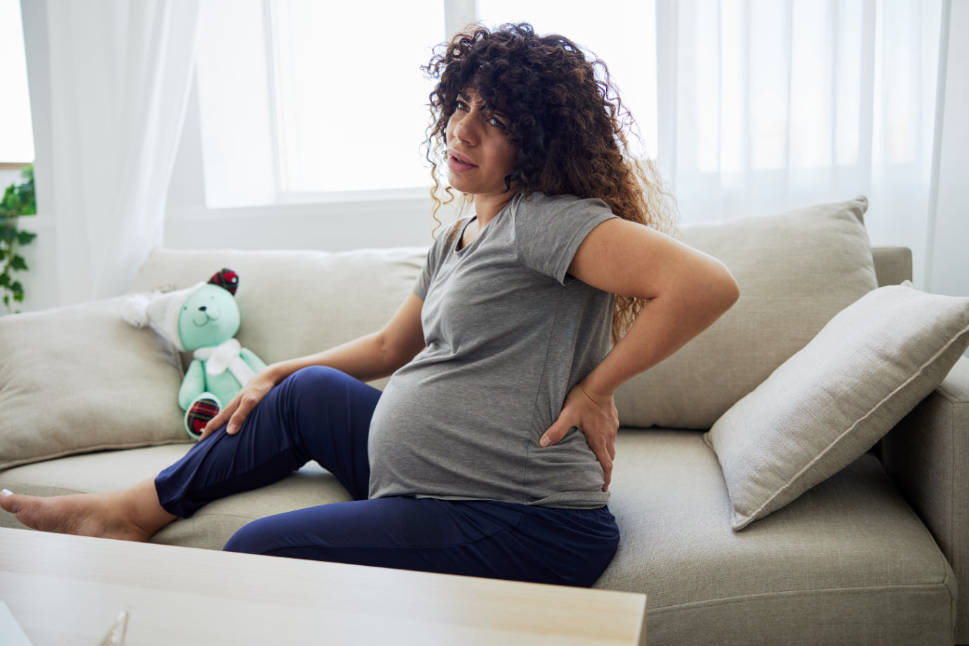 pregnant-woman-with-muscle-pain-during-pregnancy