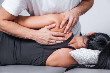 woman getting massage before or after workout